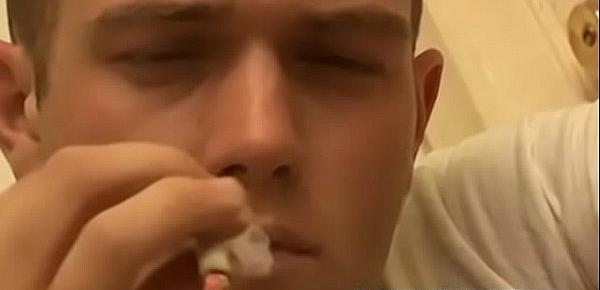  Young man smoking and stroking until his balls pump out cum